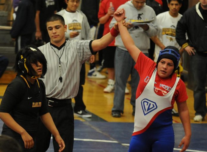 Camp Verde High School’s Adilene Ruiz is pronounced the winner of a wrestling match in the 160-pound weight class Jan. 12. Camp Verde hosted the meet and went 56-22 with 36 pins to finish 3-1 in duals. Camp Verde lost to Show Low High School.