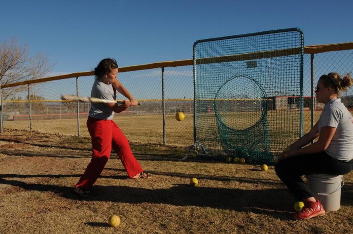 Marauders varsity softball team athlete Lashea Taylor practices hitting Monday, Feb. 14. Mingus Union High School Athletic Director Mike Boysen agreed at the MUHS District Governing Board meeting Thursday, Feb. 10 to conduct the first survey in five years to make sure the school’s sports programs are meeting the needs of the school’s female athletes.