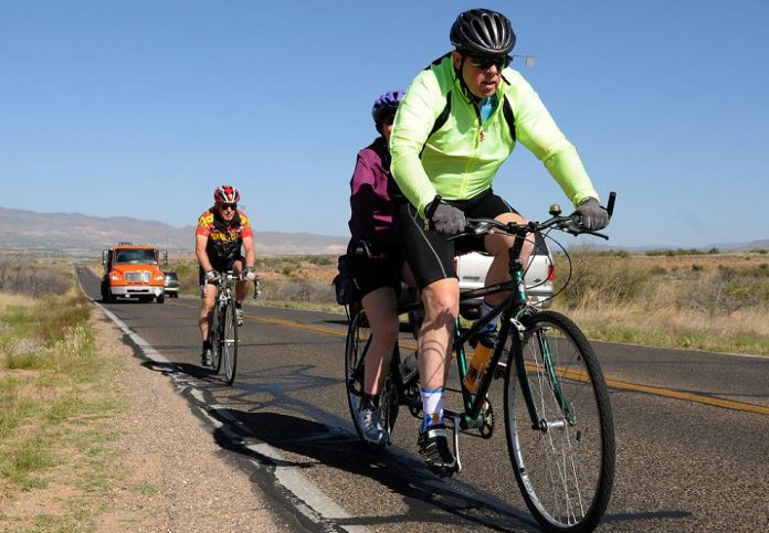 Verde Valley Cyclist Coalition riders, from right, Mark Luffman, Tina Luffman and Al Abbott share tight quarters with motorists on Cornville Road on Friday, April 29. The VVCC is currently working with Yavapai County District 3 Supervisor Chip Davis to ensure 4 feet of roadway shoulder will be included in the upcoming Cornville Road improvements between Tissaw and Aspaas Roads.