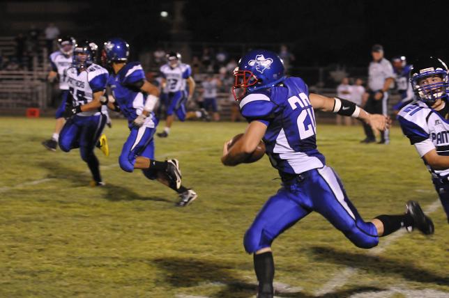 Isaiah McReynold sprints down the sideline for a touchdown against Paradise Honors on Friday, Sept. 6, at the Camp Verde football field.