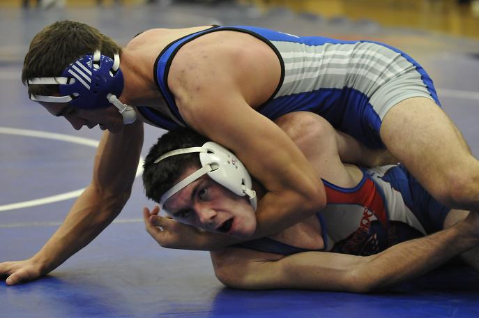 Eathan Kim of Camp Verde High School's wrestling team grapples with a Chino Valley High School wrestler Dec. 18.