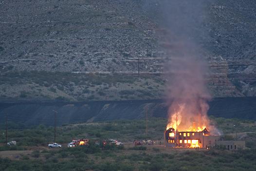 Flames engulf historic Clark Mansion, which caught fire sometime before 4:30 a.m. June 25, 2010. Clarkdale and Cottonwood fire departments and the Sedona, Camp Verde and Verde Valley fire districts all responded to battle the blaze. The building, built in the 1920s and listed on the National Register of Historic Places, was a total loss, but the site may be rezoned by the town of Clarkdale.