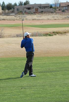 Sophomore Joel Beauty studies his second shot for Camp Verde High School’s golf team at the seventh hole of Verde Santa Fe Golf Course during the Cowboys’ opening match. Beauty would meet the state qualifying score for the front nine holes of the course but CVHS would ultimately fall 20 strokes short of Sedona Red Rock High School, posting a 175.