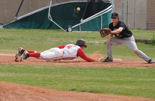 Senior outfielder Marshall Shill dives back to first base in time to avoid the tag during a Mingus Union High School Division III game last season. Shill will be counted on for pitching as well as hitting to keep the Marauders competitive in their new Division II affiliation this season.