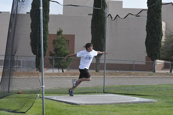 Junior Michael Malloy winds up to throw a discus Friday, April 4, at Camp Verde High School track practice.