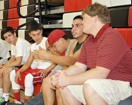 Dave Beery, right, the new head coach of the Mingus Union High School boys basketball team, talks with potential players in the program at his first open gym, held May 16 at MUHS. Beery was hired after winning 59 games and two sectional titles in three seasons at Grand Canyon High School.
