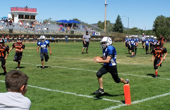 Tyler Kelly races into the end zone for a touchdown for the Cottonwood Colts at Williams, two of the nine teams in Northern Arizona Youth Football, which is sponsoring a camp for such players Saturday, June 7, at 10 a.m. at Mingus Union High School’s Bright Field.