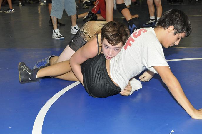 Hayden Bowers, top, an eighth-grader at Camp Verde Middle School, took on Jake Borneman, an eighth-grader from the Levine wrestling club, at Weekend Wars on Saturday, July 19, a time for the younger wrestlers to shine, as several Camp Verde High School upperclassmen had left for a wrestling camp.