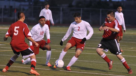 Senior Cristian Lazaro, No. 2, gets in close Tuesday, Dec. 2, before taking his shot on goal for Mingus Union High School, but he was thwarted by the Coconino High School defense. The Marauders boys soccer team nevertheless defeated the visiting Panthers, 2-1.