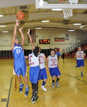 Eighth-grader Tyree Leonard attempts a baseline jumper during Camp Verde Middle School’s win over Mayer Elementary School in the opening round of the Verde Valley League boys basketball tournament Friday, Jan. 30, at Cottonwood Middle School. The Cowboys won, 35-26, before losing their next two to finish in fourth place.