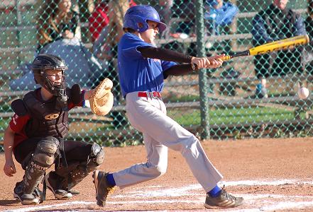 Jehiah Rogers, of the Cottonwood Rangers, pounds a pitch into the dirt during a game last month against Sedona at Posse Grounds Park. The Rangers won that game in a 14-12 slugfest but lost a playoff tiebreaker Monday, June 1, to the Giants, who advanced to face the Camp Verde Angels at the Tournament of Champions. The single-elimination District 10 softball, minor and major league baseball tournament begins Friday, June 5, at Riverfront Park.