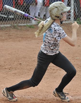 Rachel Stockseth, an infielder for the Camp Verde club softball team Juggernaut, the ball hard and drives it into the dirt. Juggernaut went 2-2 in the Cottonwood Classic in late October.