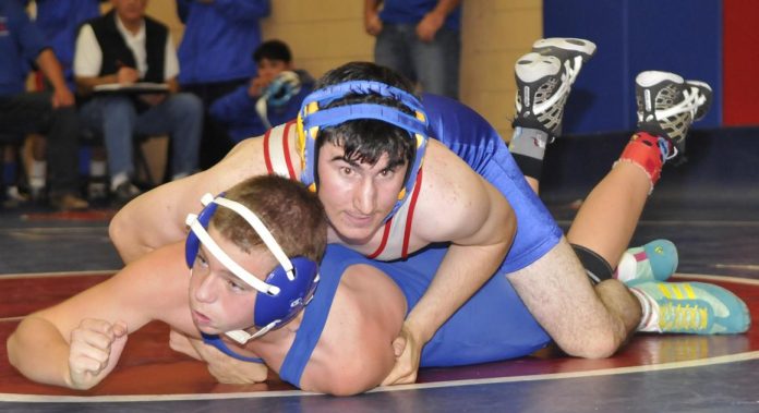 Junior Jay McFarland, top, wrestles Northland Prep sophomore Zach Bivens at the CVHS meet. McFarland went 3-1 at 145 pounds in his first varsity meet in preparation for Sunnyside High School and Verde Duals, to be held Friday, Dec. 4.