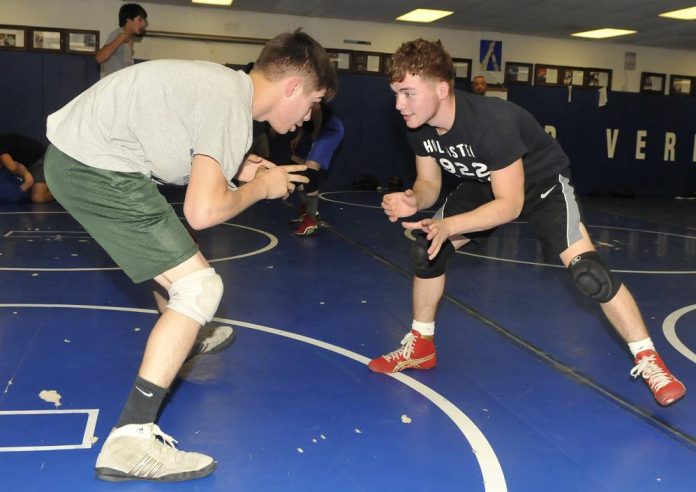 Senior Alex Casillas and his brother, Ezekiel, a junior, from left, face off in an early-season wrestling practice for Camp Verde High School. Alex Casillas was in the hunt for his fourth state title in four years when he dislocated his shoulder Jan. 22 at the Sand Devil Classic. Ezekiel Casillas would go on to win the Division IV, Section II title, as did the Cowboys on Saturday, Feb. 6.