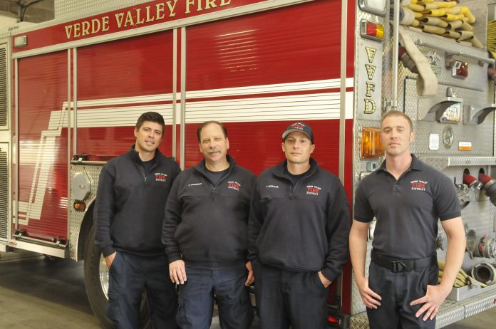 Firefighter EMT reserve Steven Stack, engineer paramedic Roland Wagenbach, firefighter EMT Paul Morales and firefighter paramedic Rick Wintermute, from left, are all part of the Verde Valley Fire District. VVFD is considering merging services with the Clarkdale Fire District.