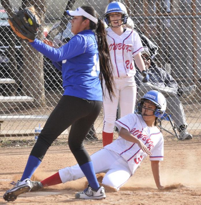Sophomore Claudia Escobedo slides safely into home for the Camp Verde High School softball team during its March 23 win over Hopi High School. The Cowboys, ranked No. 6 in Division IV by the Arizona Interscholastic Association, beat Monument Valley High School on Friday, April 8, to improve to 11-1 in divisional play.