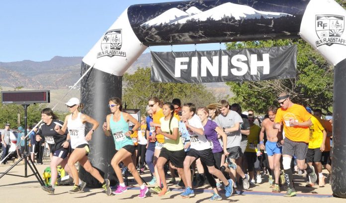 Cornville runner Brenda Williams, second from left, fires off the start line at Blazin’ M Ranch along with 50 other racers April 2 in the fifth annual Loven Family Run 10K. Williams, 42, the 10K runner-up, was the top local finisher in the run out of a field of 250 total entries. That number is expected to double Saturday, April 16, in the four races of the eighth annual Brian Mickelsen Run and Walk, which will begin at 6 a.m. at Riverfront Park.