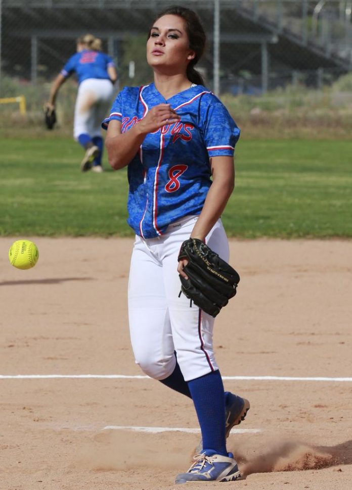Senior Taya Smith whips a pitch to the plate for Camp Verde High School in a win at Sedona Red Rock High School. The pitcher allowed just two hits, helping herself with a run batted in, as the second-seeded Cowboys opened the Division IV state tournament with their third win of the season over Chino Valley High School, 15-1.