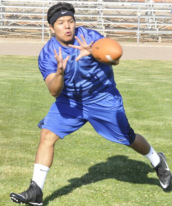 Reyes Hererra, a senior for Camp Verde High School, catches a pass at practice. Hererra, a lineman his first three years in the football program, has caught a couple of touchdown passes in his first two competitive games of the summer at wide receiver. Head coach Steve Darby’s team will host another seven-on-seven and Big Man challenge Wednesday, June 15, after going 3-1-2 in both competitions at home June 8.