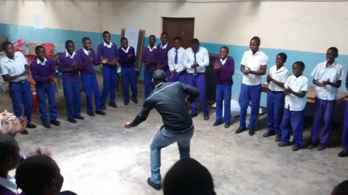 Uswege Mwakapango, co-founder of the educational advocacy group Renew, leads Tanzanian students through a workshop. Sedona Red Rock High School graduate Adam Rubin helped found the organization in 2013 and recently helped bring its workshops to area classrooms.