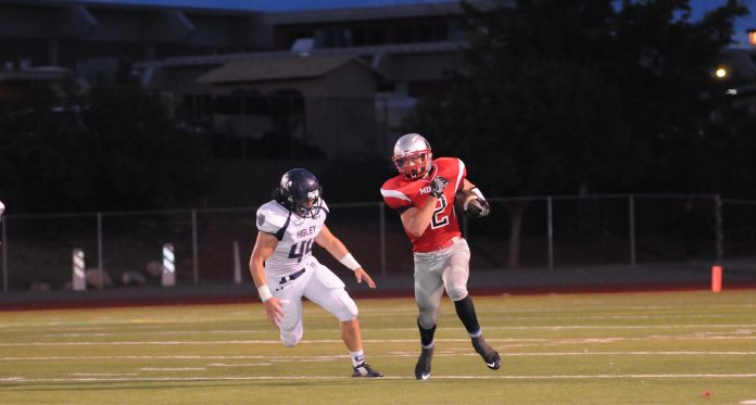 Senior running back Jason Groth, shown here in a game earlier this season, led Mingus Union High School in rushing in the Marauders 27-14 loss at Bradshaw Mountain High School Friday, Sept. 30. He also scored a touchdown.