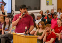 Dozens defend A Troupe Of Ridiculous Thespians teacher at school board meeting