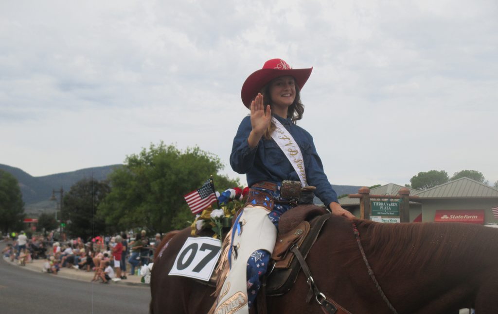 Miss Fort Verde Days Rodeo Queen waves from her horse at the 70th Annual Fort Verde Parade on Saturday, Oct. 10, 2026.