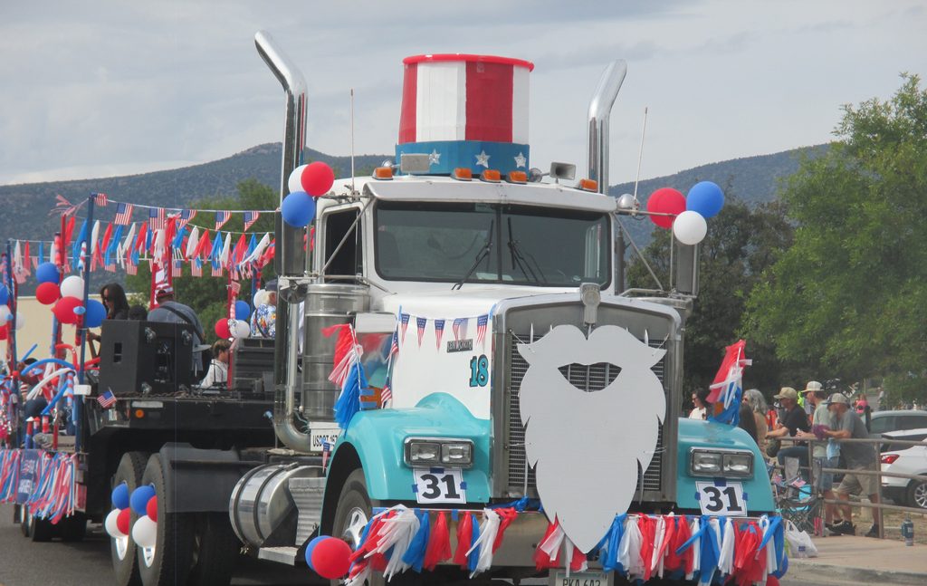 A truck decorated in an Uncle Sam theme ambles down Finnie Flat Road at the 70th Annual Fort Verde Parade on Saturday, Oct. 10, 2026.